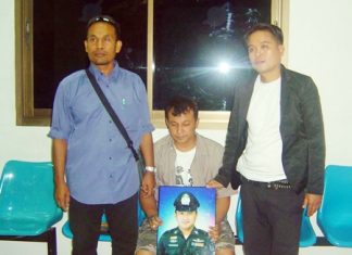 Police held suspect Sethawuth Phanusithidechanont (seated) long enough to take this photo, but lost him later from Banglamung Hospital.